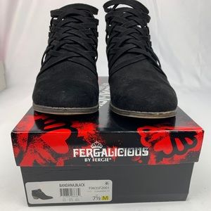 Black ankle boots by Fergie